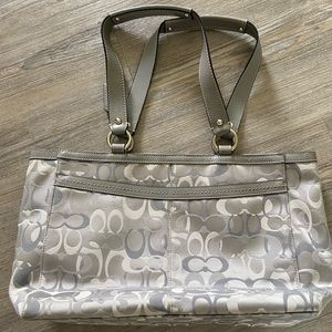 Gray/silver Coach purse